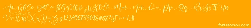 ValledofasJustPersonalOnly-fontti – keltaiset fontit oranssilla taustalla