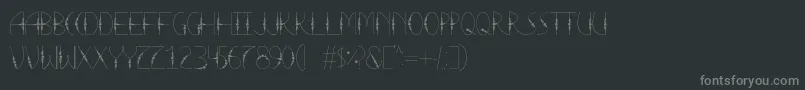 LaTortura-fontti – harmaat kirjasimet mustalla taustalla