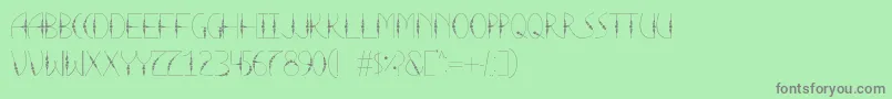 フォントLaTortura – 緑の背景に灰色の文字