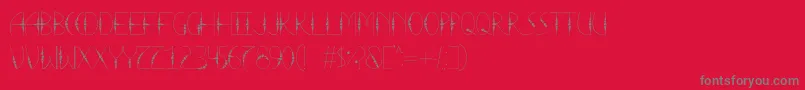 フォントLaTortura – 赤い背景に灰色の文字