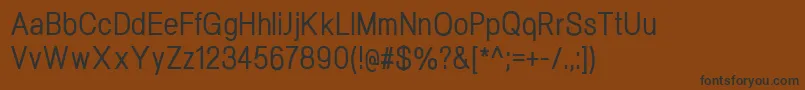 フォントNeogramMediumcnd – 黒い文字が茶色の背景にあります