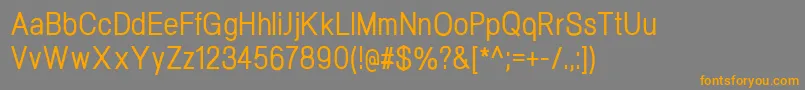 フォントNeogramMediumcnd – オレンジの文字は灰色の背景にあります。