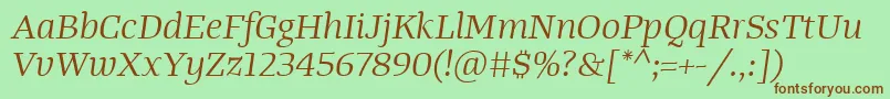 Czcionka TangerserifwideBookitalic – brązowe czcionki na zielonym tle