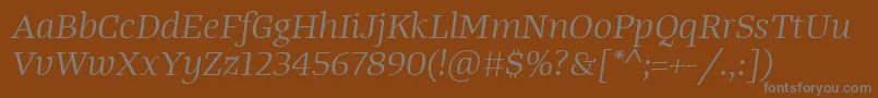 Fonte TangerserifwideBookitalic – fontes cinzas em um fundo marrom