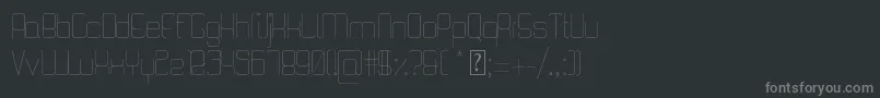 Fonte QuattroThin – fontes cinzas em um fundo preto