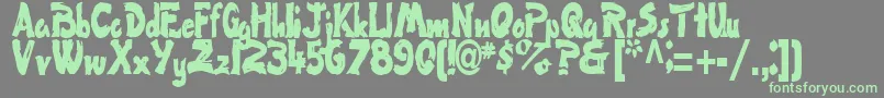 FlatRegularTtstd Font – Green Fonts on Gray Background