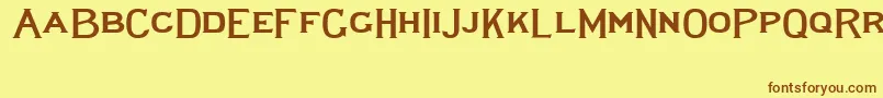 フォントLewishamwide – 茶色の文字が黄色の背景にあります。