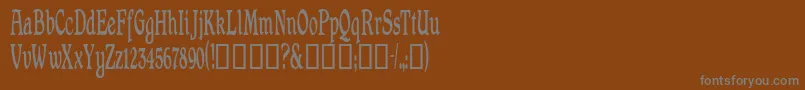 Shrewsburycondensed-fontti – harmaat kirjasimet ruskealla taustalla