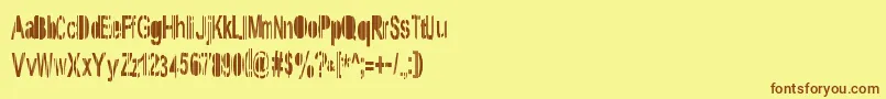 フォントSystem – 茶色の文字が黄色の背景にあります。