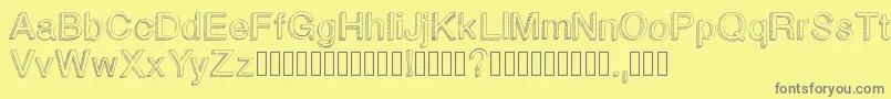 Blockbasic-Schriftart – Graue Schriften auf gelbem Hintergrund