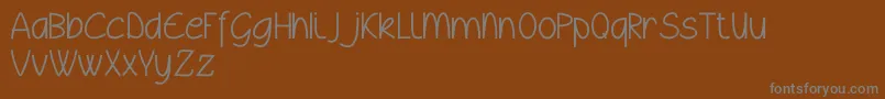 Шрифт Wyllamdemo – серые шрифты на коричневом фоне