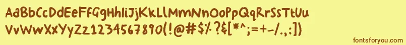 Fonte GeorginasHand – fontes marrons em um fundo amarelo