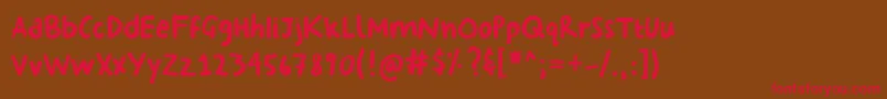 フォントGeorginasHand – 赤い文字が茶色の背景にあります。