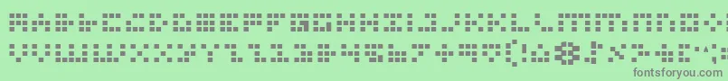 Czcionka IconianBold – szare czcionki na zielonym tle
