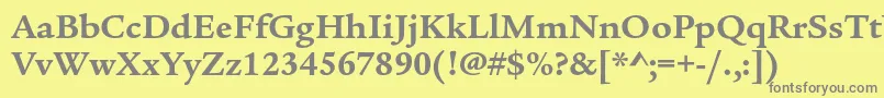 フォントLegacyserifstdBold – 黄色の背景に灰色の文字