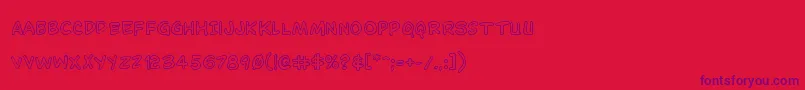 Dominomaskout Font – Purple Fonts on Red Background