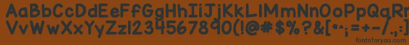 Kgmisskindymarker Font – Black Fonts on Brown Background