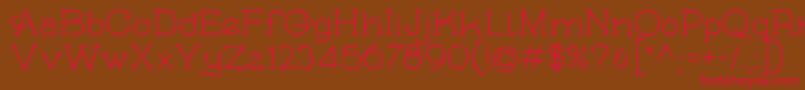 SkybirdRough-Schriftart – Rote Schriften auf braunem Hintergrund