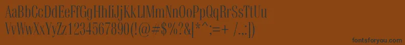 フォントVetrenc – 黒い文字が茶色の背景にあります