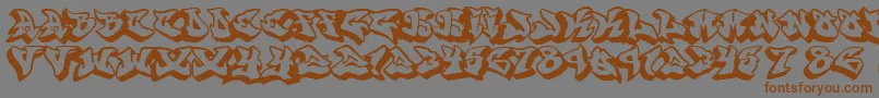 フォントGraffonti.3D.Drop – 茶色の文字が灰色の背景にあります。