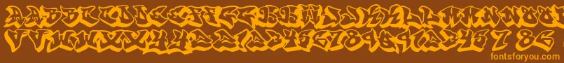 フォントGraffonti.3D.Drop – オレンジ色の文字が茶色の背景にあります。