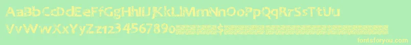 フォントGreatnineties – 黄色の文字が緑の背景にあります