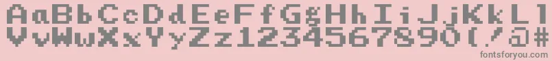 Prstart-fontti – harmaat kirjasimet vaaleanpunaisella taustalla