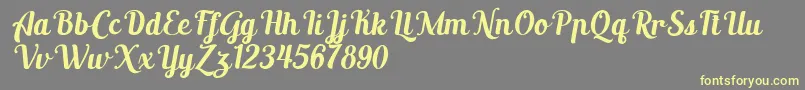 AltoysitalicPersonalOnly Font – Yellow Fonts on Gray Background