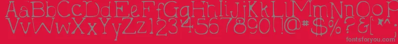 フォントDjbHollyTyped2Much – 赤い背景に灰色の文字