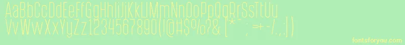 PostscriptumLight-fontti – keltaiset fontit vihreällä taustalla