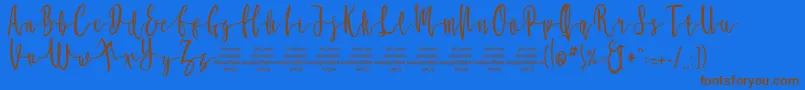 MollucaFree Font – Brown Fonts on Blue Background