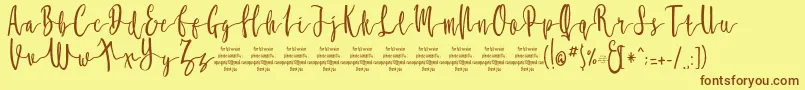 MollucaFree Font – Brown Fonts on Yellow Background