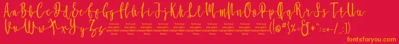 MollucaFree-Schriftart – Orangefarbene Schriften auf rotem Hintergrund