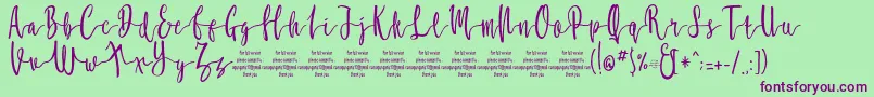 MollucaFree-Schriftart – Violette Schriften auf grünem Hintergrund