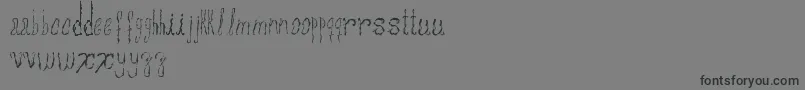 Assperiments-fontti – mustat fontit harmaalla taustalla
