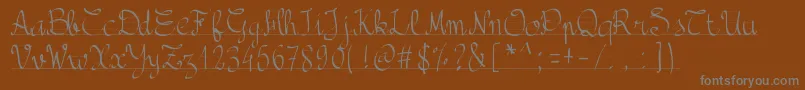 Шрифт Pwbacktoschool – серые шрифты на коричневом фоне