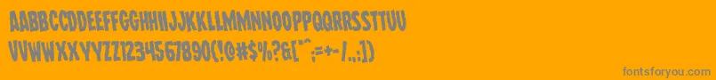 Fonte Wolfbrothersrotate – fontes cinzas em um fundo laranja