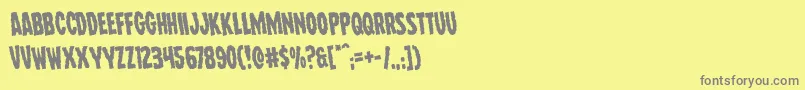 Wolfbrothersrotate-Schriftart – Graue Schriften auf gelbem Hintergrund