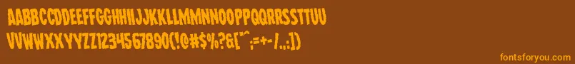 Wolfbrothersrotate-Schriftart – Orangefarbene Schriften auf braunem Hintergrund