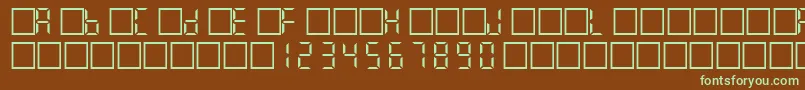 フォントFilcd – 緑色の文字が茶色の背景にあります。