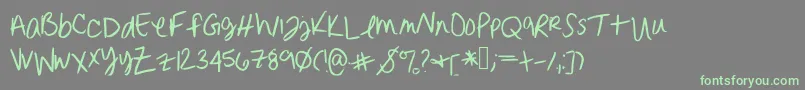Erinnhandwriting-Schriftart – Grüne Schriften auf grauem Hintergrund