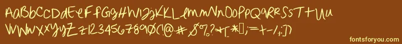 Erinnhandwriting-Schriftart – Gelbe Schriften auf braunem Hintergrund