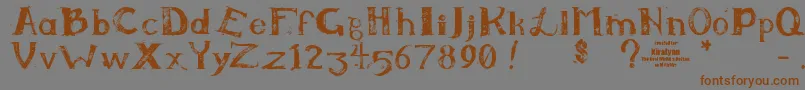 フォントKiralynn – 茶色の文字が灰色の背景にあります。