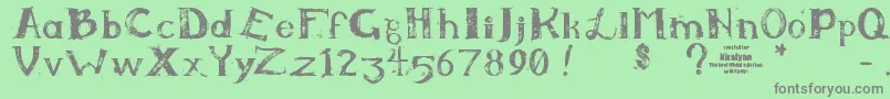 フォントKiralynn – 緑の背景に灰色の文字