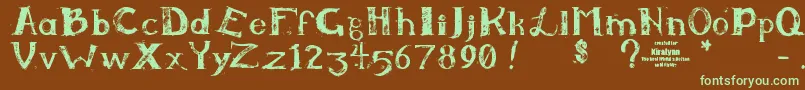 フォントKiralynn – 緑色の文字が茶色の背景にあります。