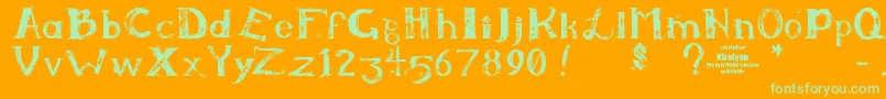 Kiralynn-Schriftart – Grüne Schriften auf orangefarbenem Hintergrund