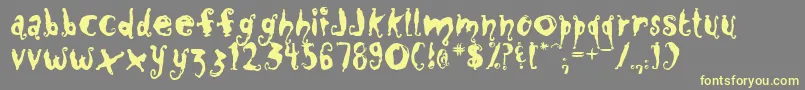 Closm Font – Yellow Fonts on Gray Background