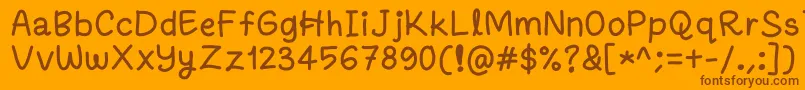 Fanandiamochamad-Schriftart – Braune Schriften auf orangefarbenem Hintergrund