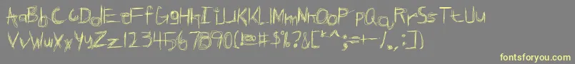BrokenPhoneNails Font – Yellow Fonts on Gray Background