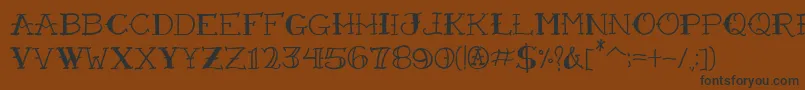 VtcFreehandtattooone Font – Black Fonts on Brown Background